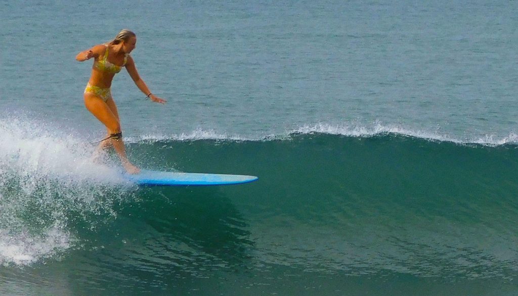 Delilah surfing