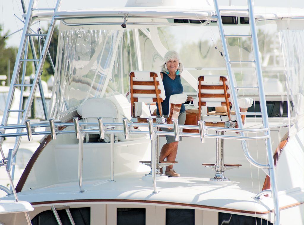 Pat Bradford photographed at the helm of Wrightsville Beach’s Trial Size,
a 61-foot Garlington owned by Phillip David, for our June 2018 issue. | Allison Potter.
