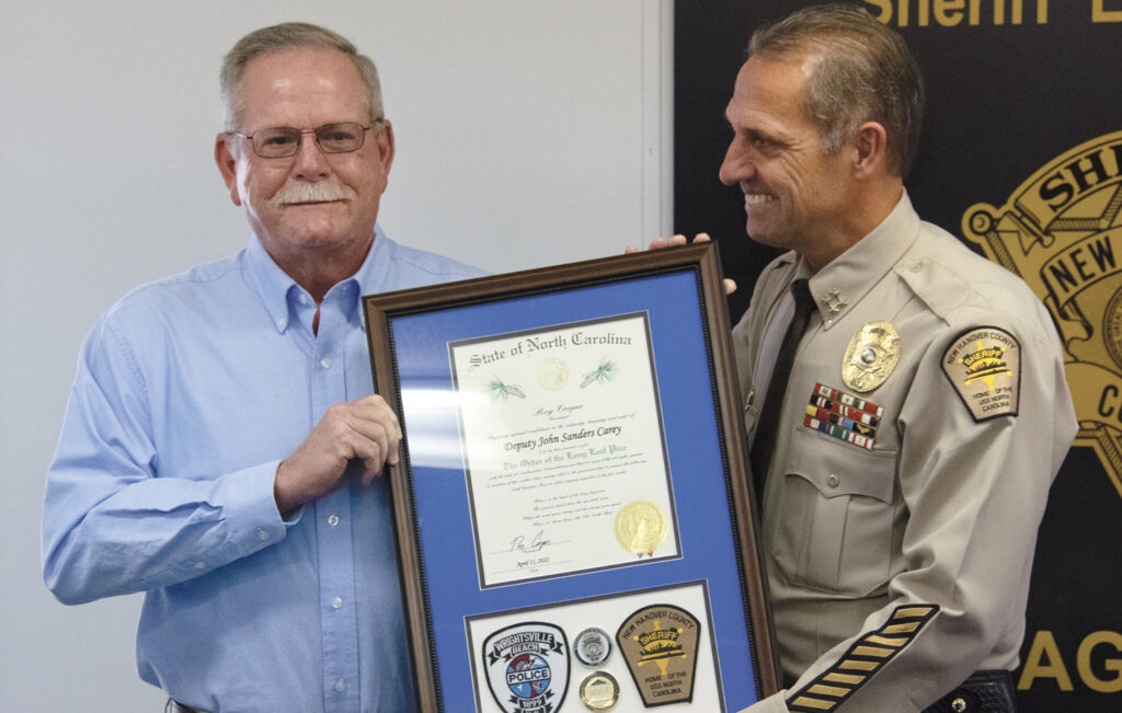 John Carey, left, with New Hanover County Sheriff Ed McMahon. New Hanover County Sheriff Office
