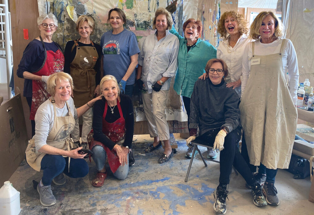 The artists gather for an official 2022 group shot in Santa Fe. Top row, left to right: Peggy Vineyard, Duane Couch, Cookie Ashton, Ashley Andrews, Nancy Hirsch Lassen, Kirby Kendrick and Dawn Harris Brown. Bottom row: Nell Tilton, Merry Calderoni and Robin Crutcher.