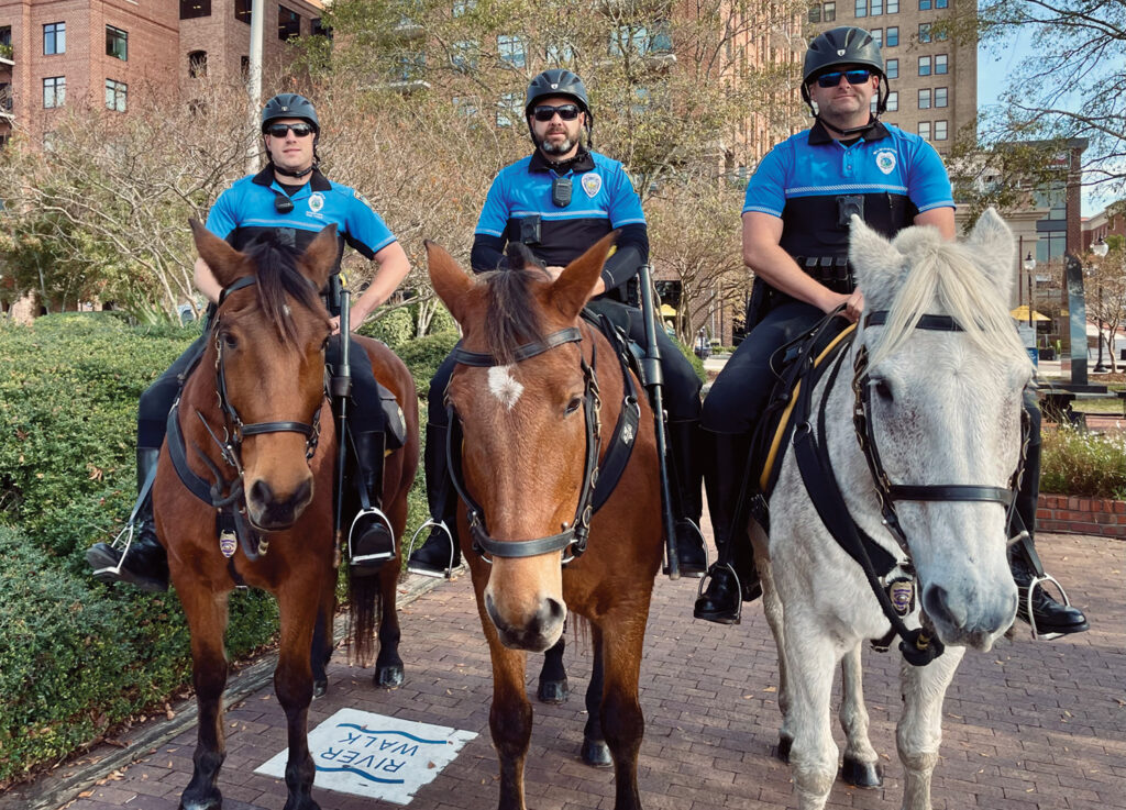 Patrolling downtown on the Wilmington Riverwalk are Elton and Ofc. A. Mininger, Crescent and Ofc. J. Watts, and Comet and Ofc. B. Campbell. Courtesy Wilmington Police Department