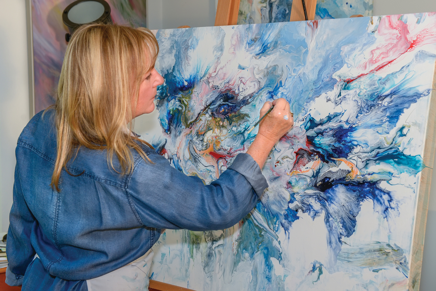 Artist Jane Baldridge at work. 