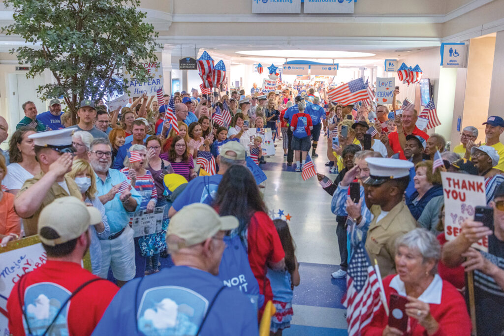 The April 2023 Honor Flight welcome home celebration at Wilmington airport. Courtesy of Honor Flight of the Cape Fear Area