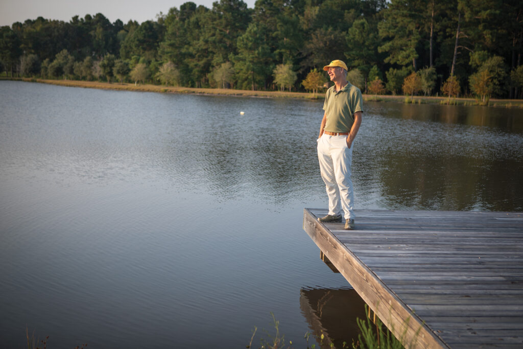 Richard Johnson at the Penderlea Farms 4-acre pond in August. Steve McMillan