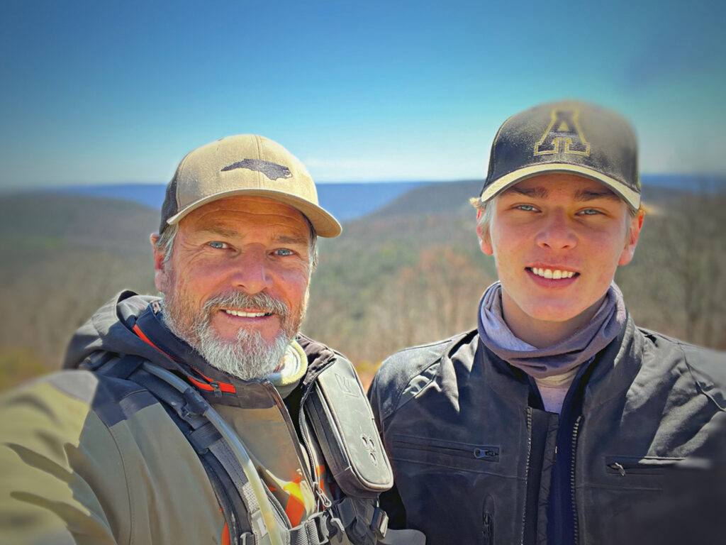 Todd McLeod and his youngest son, Dossie, aka Goose, in Pennsylvania during a 1,000 mile, 7-day off-road motorcycle trip in 2023. Photography by McLeod Photo Co.