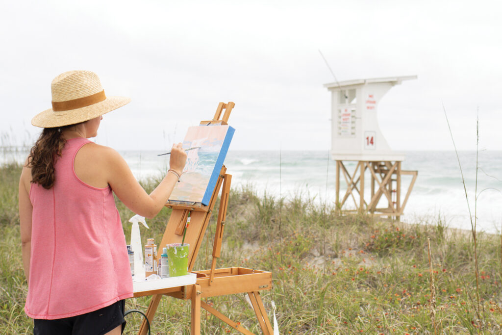 Sarah Jane Tart painting lifeguard stand No. 14 at Beach Access No. 40. Ella Friberg